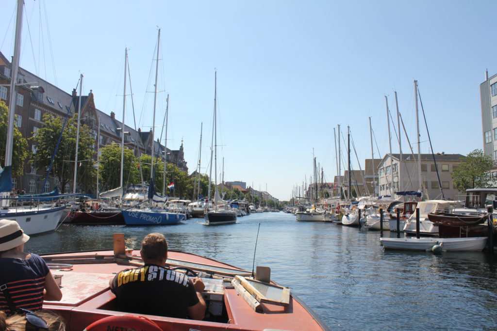 Red boat on Amsterdam canal